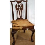 An eighteenth century Irish mahogany side chair, the pierced splat back with a serpentine crest,