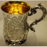 An unusual Victorian pint tankard, the body engraved an initialled cartouche tied to panels of an