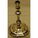 A George II cast silver taperstick, the campana shape taper holder on a knopped baluster stem, to