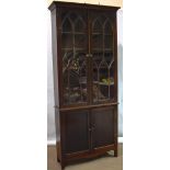 A pair of mid nineteenth century Scottish mahogany library bookcases, the top sections with