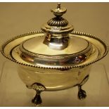 An early nineteenth century Dutch silver oval sauce tureen, with bead edges, the cover with a