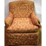 Howard & Sons Ltd. A late Victorian easy armchair, the sprung seat on front turned walnut legs,