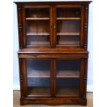 A small early Victorian rosewood cabinet, with a cavetto cornice above adjustable shelves,