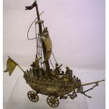 A small Nineteenth century Austrian silver and gilded Nef, the deck of the boat is the lid, with