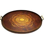 A George III mahogany oval tray, the centre with a marquetry plumed oval sunflower head, fiddle back