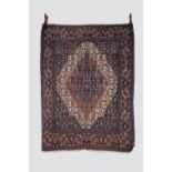 Senneh rug, north west Persia, circa 1930s, 4ft. 9in. X 3ft. 7in. 1.45m. X 1.09m. Slight wear in