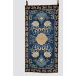 Japanese rug, first half 20th century, 6ft. 3in. X 3ft. 1in. 1.91m. x 0.94m. Pale blue field with