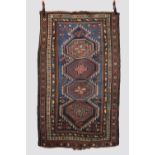 Kurdish rug, north west Persia, circa 1920s-30s, 5ft. 7in. x 3ft. 6in. 1.70m. X 1.09m. Overall wear;