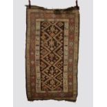 Four rugs comprising: the first: Kurdish rug, north west Persia, circa 1930s, 6ft. 7in. X 3ft.