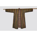 Two robes, the first an Afghan striped silk robe, Afghanistan, circa 1930s-40s, 26in. 66cm.