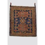 Three rugs: the first, Karaja, north west Persia, circa 1930s-40s, 4ft. 2in. X 3ft. 8in. 1.27m. X