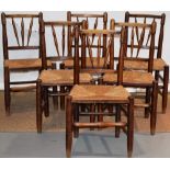 A set of six mid nineteenth century ash Yorkshire spindle back side chairs, with rush seats, on