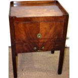A George III mahogany bedside cupboard, the rectangular galleried top above a lift up well figured