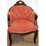 A nineteenth century Continental show frame walnut writing chair, the buttoned wrap round back