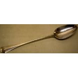 An early George III silver hash spoon, hanoverian pattern, engraved a crest, 15.1in (38.5cm) Maker