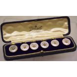 A set of six early nineteenth century 9ct gold and mother of pearl dress buttons, cased.