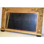 A George IV gilt frame landscape overmantle mirror, with a soft bevelled rectangular plate, the