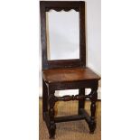 A late seventeenth century oak back stool, the seat board replaced, on front turned and block