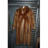 A full length Fox Fur Coat,