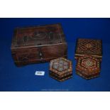 A Middle Eastern carved Box and three inlaid Trinket Boxes