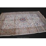 A modern cream, gold, blue and red Persian style Rug,