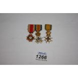 Three Miniature gilt and enamel Medals