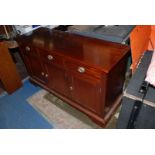 A good reproduction Mahogany Sideboard having three frieze drawers over three cupboards below and