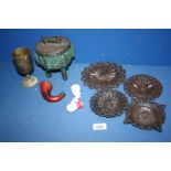 A quantity of miscellanea including small metal plaques, lidded three legged pot, goblet,