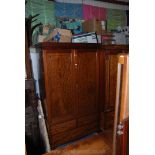 An Edwardian Mahogany Georgian style double door Wardrobe with cornice over opposing pair of