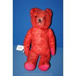 An old red straw filled Teddy Bear, 16'' tall.