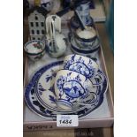 A quantity of blue and white china including Delft windmill, jug, Bols house, cups and saucers,