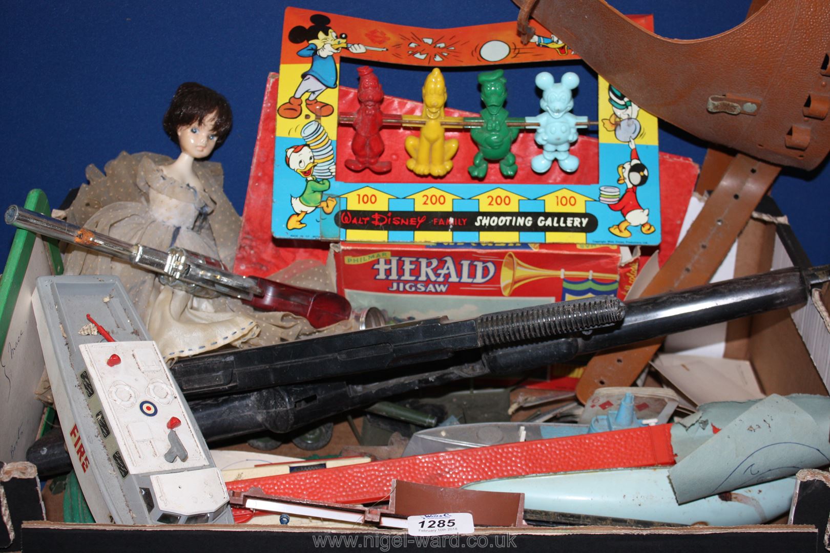 A quantity of old Toys including a Walt Disney family shooting gallery, old Herald jigsaw,