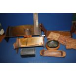A quantity of treen including two book troughs, two wooden sliding bookends, etc.