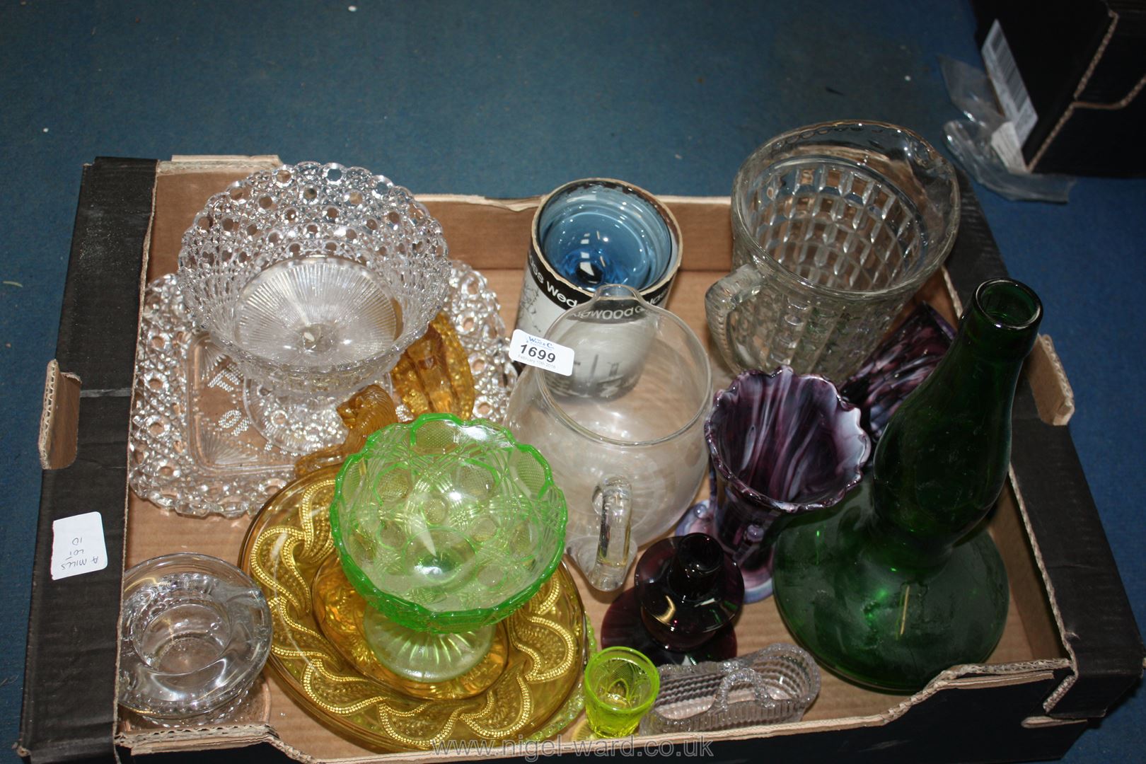 A box of miscellaneous glass including candle holders, jugs,