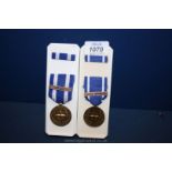 Two boxed NATO Medals, one with bar "former Yugoslavia', the other bar I.S.A.F.