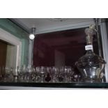 An antique Venetian style Decanter with twelve matching glasses.