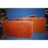 Two leather Suitcases, one marked W.S.E.
