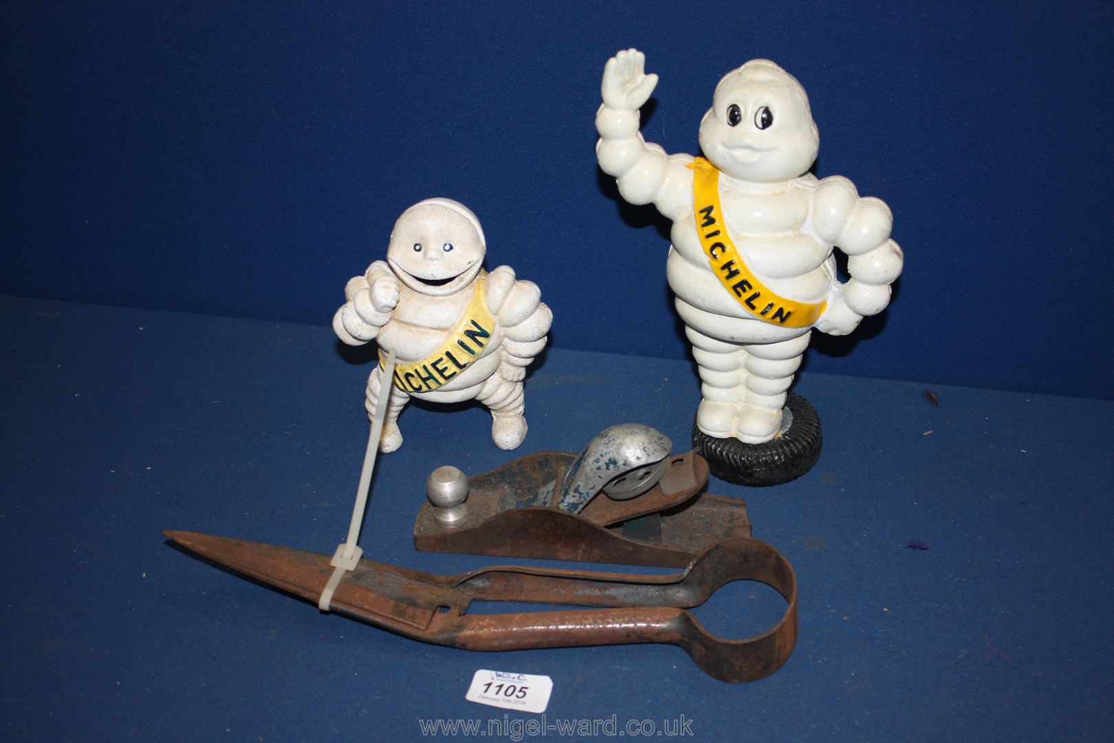 A pair of Dagging Shears, a small 'Guys' wood plane and two 'Michelin' men.
