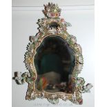 A magnificent Continental shaped and bevelled Mirror,