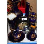 A quantity of Limoges dark blue and gold china,