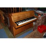 A small modern teak cased Upright Piano by Kemble, very plain finish, six octave keyboard,