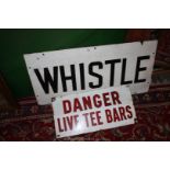 Two enamel signs 'Whistle' and 'Danger Live Tee Bars'.