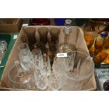 A quantity of wine glasses, cut glass jug, decanter with stopper, vase, etc.