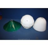 A white glass lamp Shade and green glass coolie Shade