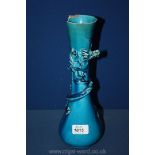 A turquoise glazed Vase with an entwined Chinese dragon applied 31 cms tall,