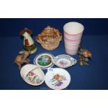 A small quantity of china including Purbeck Pottery basket, pottery Elephant, bird figure,