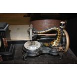 An old Jones hand sewing machine.