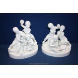 A pair of modern white porcelain models of child musicians,