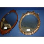 Two small Oval Mirrors