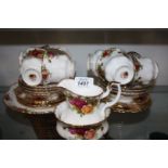 An eight setting Royal Albert 'Old Country Roses' including bread and butter plate and sugar bowl